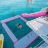 Water slide and floating mat from the catamaran