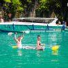 Clear kayak and speedboat in Pileh Lagoon