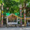 Moken village totem poles