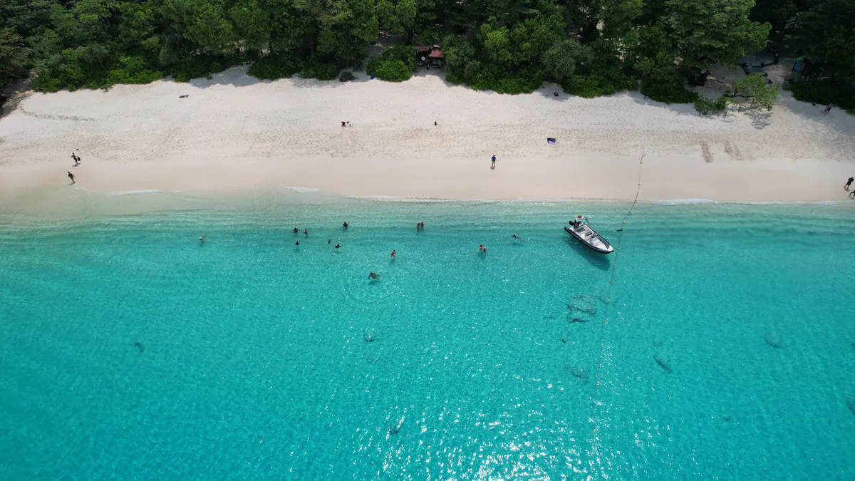 Turquoise water along a Similan beach